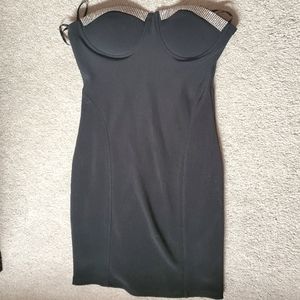 Forever 21 black dress. Rhinestones up top. Zip up back.